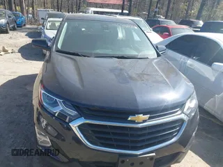 2020 Chevrolet Equinox LT with VIN 3GNAXKEV0LS702680, listed as a IAAI auction lot 41633024 with 63,041 mi miles and . Bid and sale history available at carsss.com. Image 12.