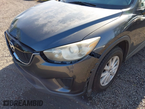 2014 Mazda CX-5 Sport with VIN JM3KE2BE8E0313407, listed as a IAAI auction lot 41215428 with 120,387 mi miles and . Bid and sale history available at carsss.com. Image 18.