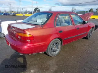 2001 Chevrolet Prizm z VIN 1Y1SK528X1Z406430, wystawiony jako IAAI lot #41789273 z przebiegiem 185 620 mil mil oraz . Historia ofert i sprzedaży dostępna na DreamBid. Obrazek 4.