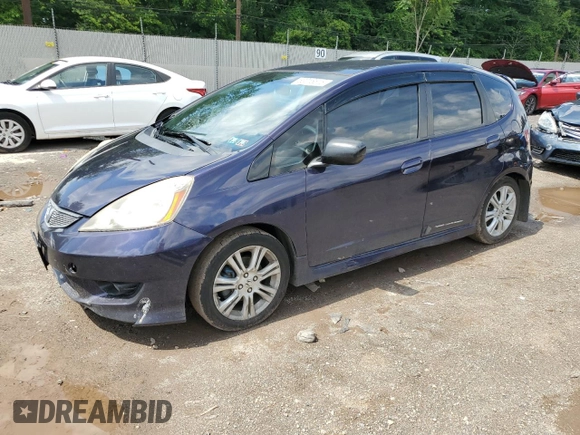 2010 Honda Fit Sport with VIN JHMGE8H44AC013385, listed as a Copart auction lot 63216515 with 228,358 mi miles and Salvage title. Bid and sale history available at DreamBid. Image 1.