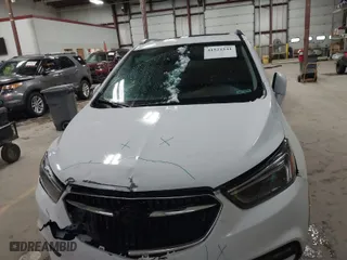 2019 Buick Encore Essence with VIN KL4CJCSM0KB888312, listed as a IAAI auction lot 41521541 with 135,219 mi miles. Bid and sale history available at carsss.com. Image 12.