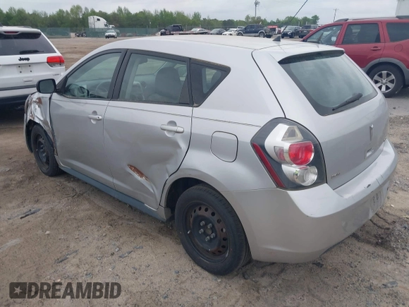 2009 Pontiac Vibe w/1SB with VIN 5Y2SP67009Z428804, listed as a IAAI auction lot 41959697 with 208,681 mi miles. Bid and sale history available at carsss.com. Image 3.