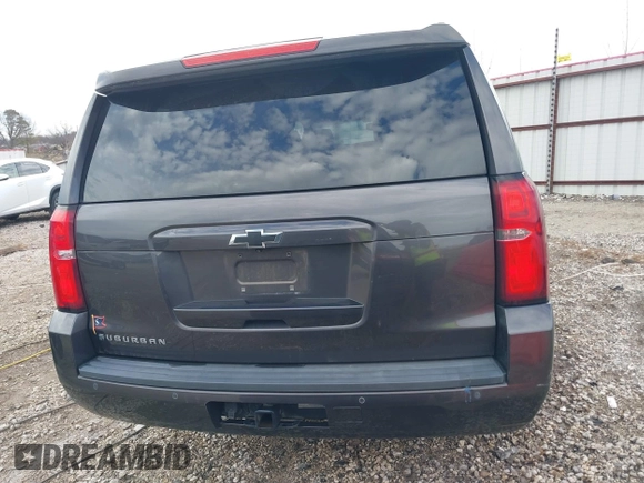 2015 Chevrolet Suburban LT with VIN 1GNSKJKC8FR717435, listed as a IAAI auction lot 41313726 with 120,731 mi miles and . Bid and sale history available at DreamBid. Image 16.