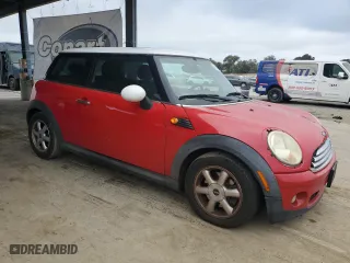 2010 MINI Cooper Hardtop with VIN WMWMF3C52ATZ63438, listed as a Copart auction lot 54424245 with 107,201 mi miles and Clean Title. Bid and sale history available at carsss.com. Image 4.