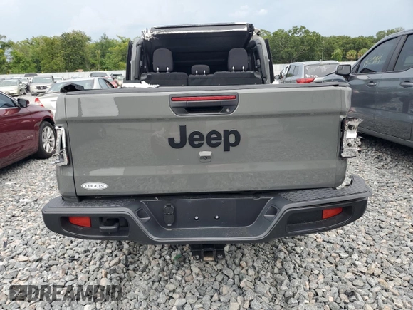 2023 Jeep Gladiator Sport S with VIN 1C6HJTAG9PL506729, listed as a Copart auction lot 58372235 with 52,633 mi miles and Non repairable. Bid and sale history available at DreamBid. Image 6.
