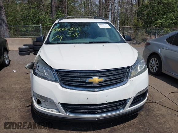 2015 Chevrolet Traverse LS z VIN 1GNKVFED8FJ257149, wystawiony jako IAAI lot #42060101 z przebiegiem 150 738 mil mil oraz . Historia ofert i sprzedaży dostępna na DreamBid. Obrazek 12.