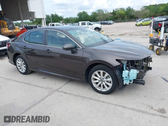 2019 Toyota Camry LE with VIN 4T1B11HKXKU818442, listed as a IAAI auction lot 41906128 with 30,728 mi miles and . Bid and sale history available at DreamBid. Image 1.