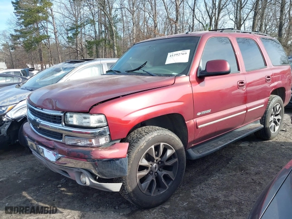 2003 Chevrolet Tahoe LT with VIN 1GNEC13ZX3R307650, listed as a IAAI auction lot 41292769 with 313,720 mi miles. Bid and sale history available at carsss.com. Image 2.