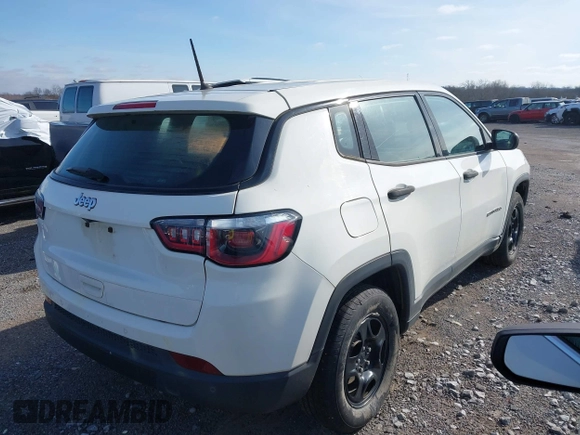 2018 Jeep Compass Sport with VIN 3C4NJCABXJT263332, listed as a IAAI auction lot 41554259 with 91,156 mi miles and . Bid and sale history available at DreamBid. Image 4.