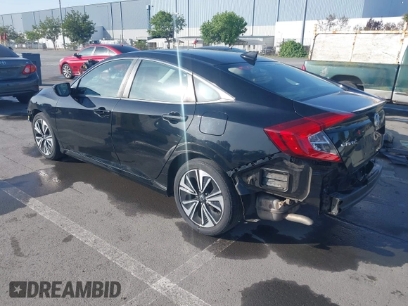 2016 Honda Civic Sedan EX-L with VIN 19XFC1F73GE215112, listed as a IAAI auction lot 42093218 with 67,233 mi miles. Bid and sale history available at carsss.com. Image 3.