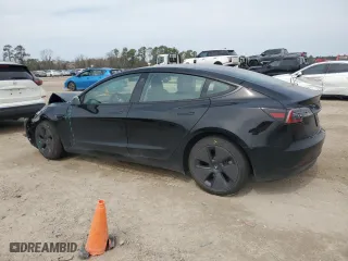 2023 Tesla Model 3 with VIN 5YJ3E1EA5PF421598, listed as a Copart auction lot 47036995 with 6,511 mi miles and Salvage Title. Bid and sale history available at carsss.com. Image 2.