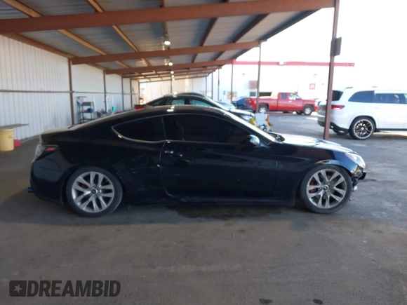 2014 Hyundai Genesis Coupe R-Spec z VIN KMHHT6KD0EU114041, wystawiony jako IAAI lot #41752761 z przebiegiem 107 377 mil mil oraz . Historia ofert i sprzedaży dostępna na DreamBid. Obrazek 14.