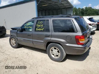 2002 Jeep Grand Cherokee with VIN 1J8GX48S12C255290, listed as a Copart auction lot 57832025 with 191,293 mi miles and Non repairable. Bid and sale history available at DreamBid. Image 2.