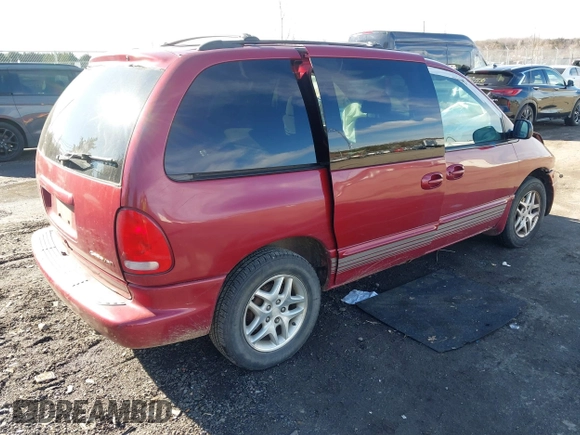1999 Dodge Caravan z VIN 1B4GP45G7XB554879, wystawiony jako IAAI lot #41644242 z przebiegiem Nie podano mil oraz . Historia ofert i sprzedaży dostępna na DreamBid. Obrazek 4.