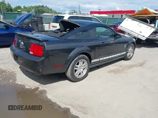 2009 Ford Mustang with VIN 1ZVHT80N395126614, listed as a IAAI auction lot 42322380 with 51,373 mi miles and . Bid and sale history available at DreamBid. Image 4.