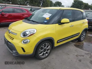 2014 FIAT 500L Trekking with VIN ZFBCFADH6EZ013536, listed as a IAAI auction lot 40313919 with 77,690 mi miles and . Bid and sale history available at DreamBid. Image 2.