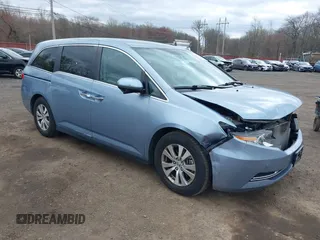 2014 Honda Odyssey EX with VIN 5FNRL5H46EB016800, listed as a IAAI auction lot 42048768 with 144,677 mi miles and . Bid and sale history available at carsss.com. Image 1.