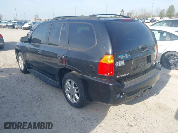 2008 GMC Envoy Denali with VIN 1GKET63M782214289, listed as a IAAI auction lot 42094430 with 250,000 mi miles. Bid and sale history available at carsss.com. Image 3.