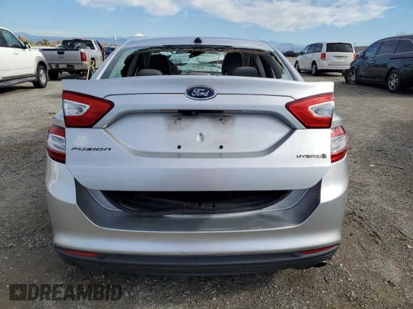 2015 Ford Fusion S Hybrid with VIN 3FA6P0UU6FR157842, listed as a Copart auction lot 83024044 with 0 mi miles and Salvage Title. Bid and sale history available at carsss.com. Image 6.