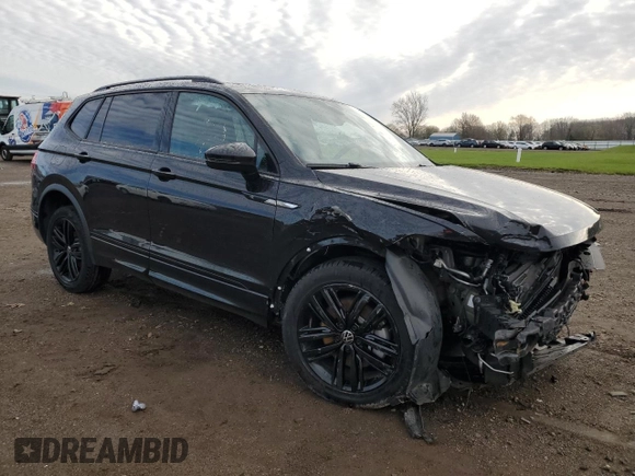 2022 Volkswagen Tiguan SE R-Line Black z VIN 3VV8B7AX9NM088599, wystawiony jako Copart lot #52118695 z przebiegiem 27 836 mil mil oraz Szkody całkowita. Historia ofert i sprzedaży dostępna na DreamBid. Obrazek 4.