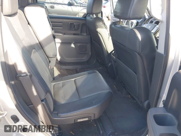 2006 Honda Ridgeline RTL z VIN 2HJYK165X6H570027, wystawiony jako IAAI lot #41868389 z przebiegiem 207 020 mil mil oraz . Historia ofert i sprzedaży dostępna na DreamBid. Obrazek 8.
