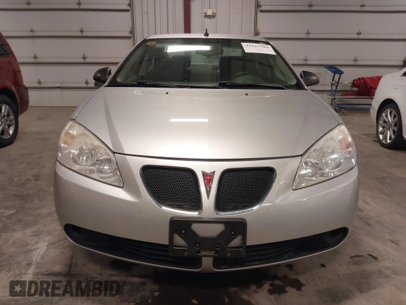 2009 Pontiac G6 w/1SA *Ltd Avail* with VIN 1G2ZG57B094155004, listed as a IAAI auction lot 41925584 with 123,169 mi miles. Bid and sale history available at carsss.com. Image 13.