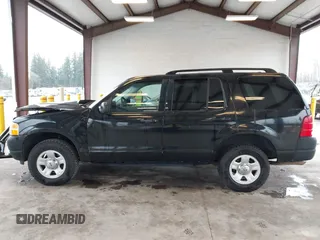 2003 Ford Explorer XLS z VIN 1FMZU62K33UB97283, wystawiony jako IAAI lot #41657337 z przebiegiem Nie podano mil oraz . Historia ofert i sprzedaży dostępna na DreamBid. Obrazek 14.