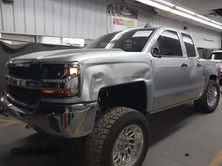 2018 Chevrolet Silverado 1500 LT with VIN 1GCVKREC1JZ151188, listed as a IAAI auction lot 42153618 with 82,391 mi miles and . Bid and sale history available at DreamBid. Image 18.