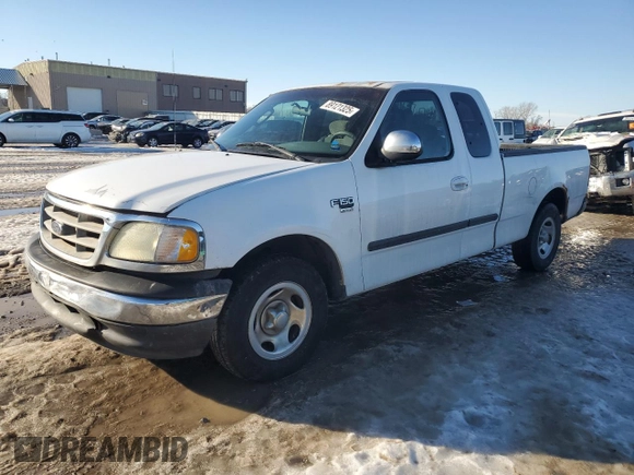 2002 Ford F-150 XL with VIN 1FTRX17L42KD35973, listed as a Copart auction lot 89121325 with 258,895 mi miles and Salvage title. Bid and sale history available at DreamBid. Image 1.