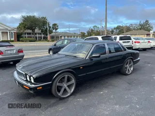 1995 Jaguar XJ with VIN SAJHX174XSC738291, listed as a Copart auction lot 87054224 with 71,076 mi miles and Clean title. Bid and sale history available at DreamBid. Image 2.