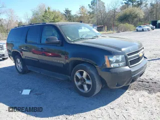 2014 Chevrolet Suburban LT with VIN 1GNSCJE01ER102657, listed as a IAAI auction lot 41896528 with 200,498 mi miles. Bid and sale history available at carsss.com. Image 1.