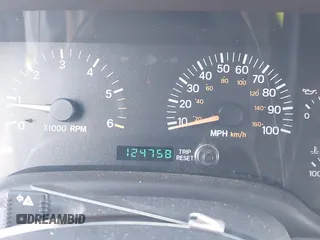 2000 Jeep Cherokee Classic with VIN 1J4FF58S7YL122676, listed as a IAAI auction lot 41710310 with 124,758 mi miles. Bid and sale history available at carsss.com. Image 7.