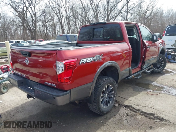 2016 Nissan Titan XD S with VIN 1N6AA1F43GN510841, listed as a IAAI auction lot 41814864 with 163,025 mi miles. Bid and sale history available at carsss.com. Image 4.