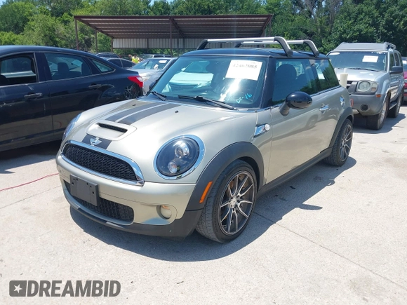 2009 MINI Hardtop S with VIN WMWMF73529TX40576, listed as a IAAI auction lot 42462085 with 77,936 mi miles and . Bid and sale history available at DreamBid. Image 2.