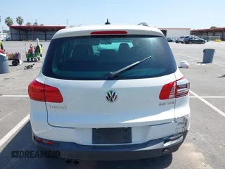 2014 Volkswagen Tiguan SEL with VIN WVGAV3AX9EW512956, listed as a IAAI auction lot 42110002 with 136,034 mi miles and . Bid and sale history available at DreamBid. Image 16.