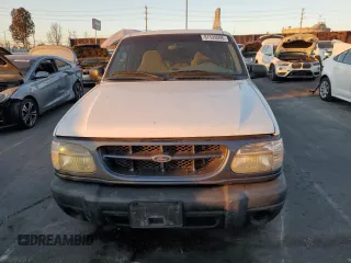 1999 Ford Explorer Sport с VIN 1FMYU22X1XUA31138, выставлен на аукционе Copart как лот 87529095 с пробегом 60 805 миль миль и Чистый • Clean title. История ставок и продаж доступна на DreamBid. Изображение 5.