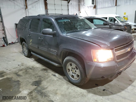 2010 Chevrolet Suburban LT with VIN 1GNUKJE31AR113223, listed as a Copart auction lot 88872875 with 221,334 mi miles and Salvage Title. Bid and sale history available at carsss.com. Image 4.