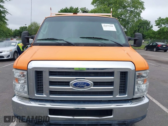 2014 Ford Econoline Cargo Commercial with VIN 1FTNE2EW3EDA64940, listed as a IAAI auction lot 42475161 with 188,421 mi miles and . Bid and sale history available at DreamBid. Image 12.