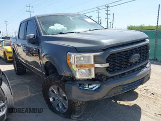 2021 Ford F-150 XL with VIN 1FTFW1E59MFA21578, listed as a IAAI auction lot 42007968 with 74,025 mi miles. Bid and sale history available at carsss.com. Image 1.