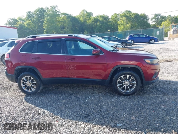 2019 Jeep Cherokee Latitude Plus z VIN 1C4PJMLX0KD101546, wystawiony jako IAAI lot #42388731 z przebiegiem 86 920 mil mil oraz . Historia ofert i sprzedaży dostępna na DreamBid. Obrazek 13.
