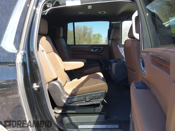 2024 Chevrolet Suburban High Country with VIN 1GNSKGKL7RR150268, listed as a IAAI auction lot 41798479 with 13,339 mi miles and . Bid and sale history available at DreamBid. Image 8.