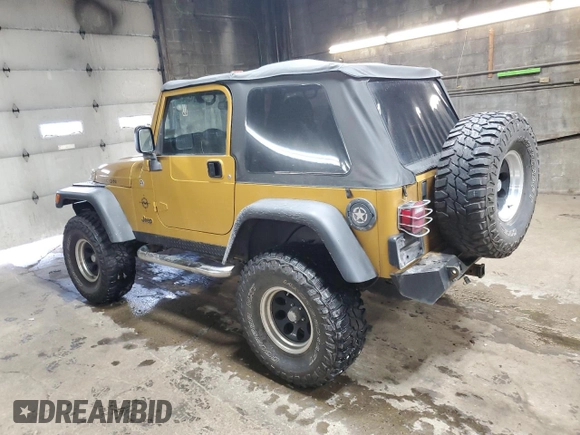 2003 Jeep Wrangler Rubicon with VIN 1J4FA69S23P322353, listed as a Copart auction lot 43915745 with 117,769 mi miles and Salvage title. Bid and sale history available at DreamBid. Image 2.