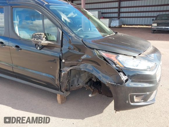 2021 Ford Transit Connect XLT with VIN NM0GS9F27M1500434, listed as a IAAI auction lot 39234991 with 25,883 mi miles and . Bid and sale history available at DreamBid. Image 6.