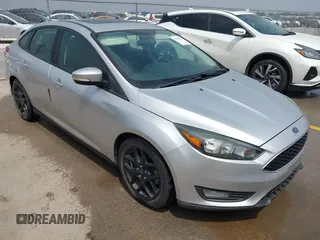 2016 Ford Focus SE z VIN 1FADP3F24GL295366, wystawiony jako IAAI lot #42268573 z przebiegiem 71 462 mil mil oraz . Historia ofert i sprzedaży dostępna na DreamBid. Obrazek 1.