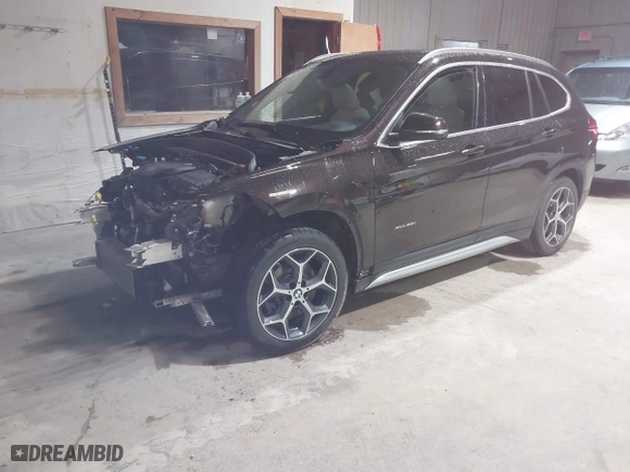 2016 BMW X1 xDrive28i with VIN WBXHT3C33GP886935, listed as a IAAI auction lot 41707367 with 73,201 mi miles. Bid and sale history available at carsss.com. Image 20.