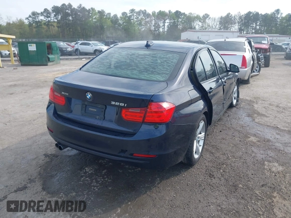 2013 BMW 3 Series 328i xDrive with VIN WBA3B5G53DNS02293, listed as a IAAI auction lot 42012883 with 243,490 mi miles. Bid and sale history available at carsss.com. Image 4.