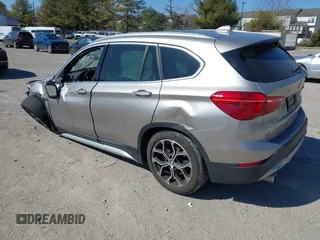 2021 BMW X1 xDrive28i with VIN WBXJG9C06M5S85511, listed as a IAAI auction lot 41705422 with 30,636 mi miles. Bid and sale history available at carsss.com. Image 3.