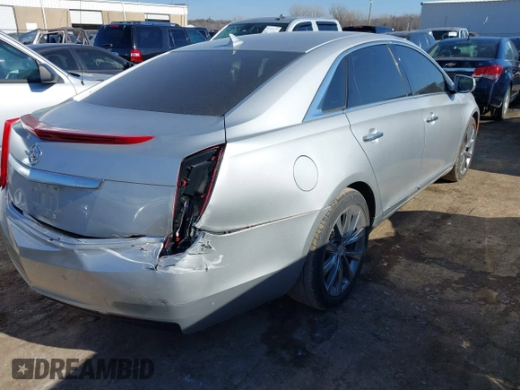 2013 Cadillac XTS with VIN 2G61N5S33D9203389, listed as a IAAI auction lot 41282913 with 72,293 mi miles. Bid and sale history available at carsss.com. Image 4.