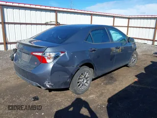 2014 Toyota Corolla L with VIN 5YFBURHE2EP040286, listed as a IAAI auction lot 41890115 with 154,584 mi miles and . Bid and sale history available at DreamBid. Image 4.