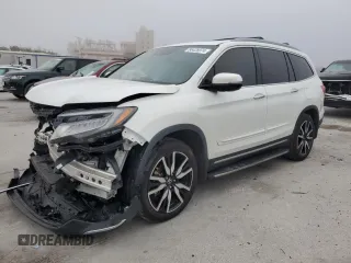 2020 Honda Pilot Touring 8-Passenger with VIN 5FNYF5H92LB020614, listed as a Copart auction lot 86428974 with Not Provided miles and Salvage Title. Bid and sale history available at DreamBid. Image 1.